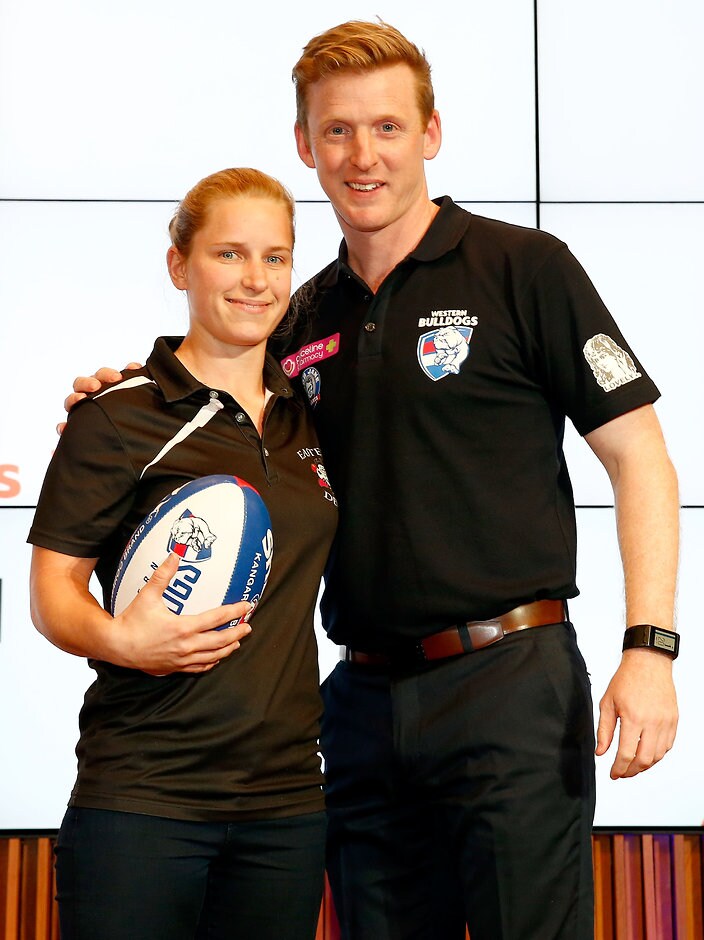 AFL 2016 Media - NAB AFLW Draft MELBOURNE, AUSTRALIA - OCTOBER 12: The number five draft pick for the Western Bulldogs Jamie Lambert is announced and poses with coach Paul Groves on stage during the 2016 NAB AFLW Draft at NAB Building on October 12, 2016 in Melbourne, Australia. (Photo by Justine Walker/AFL Media)